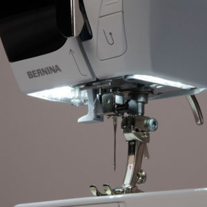 Bernina 335 has a reverse sewing feature