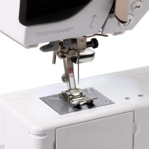 Bernina 580 has a key for sewing in reverse direction
