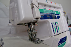 Elna 744 automatic needle threading system