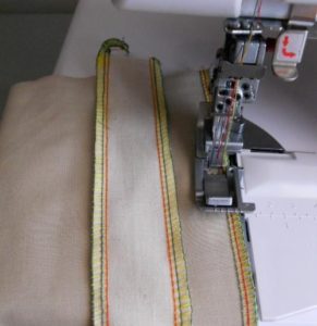 Elna 744 sewing machine is the cloth trim width adjustment