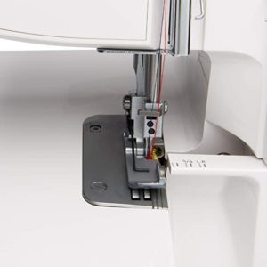 Elna Serger sewing machine comes with a tilting needle clamp